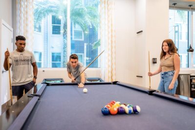 Resident playing pool